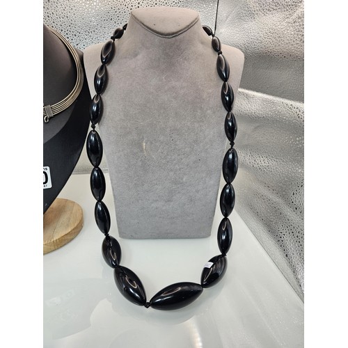 410 - Two good vintage jewellery items to include a stunning ornate white metal multi strand choker neckla... 