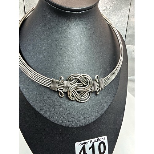 410 - Two good vintage jewellery items to include a stunning ornate white metal multi strand choker neckla... 