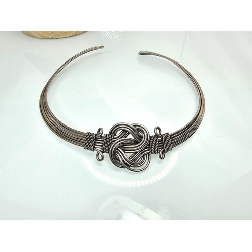 410 - Two good vintage jewellery items to include a stunning ornate white metal multi strand choker neckla... 