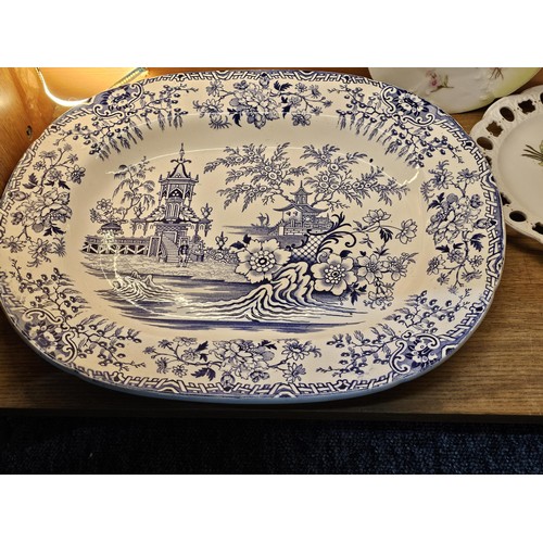 261 - A shelf full of collectable ceramics and earthenware to include 2 handmade salt sellers in the form ... 