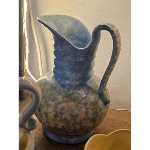 261 - A shelf full of collectable ceramics and earthenware to include 2 handmade salt sellers in the form ... 