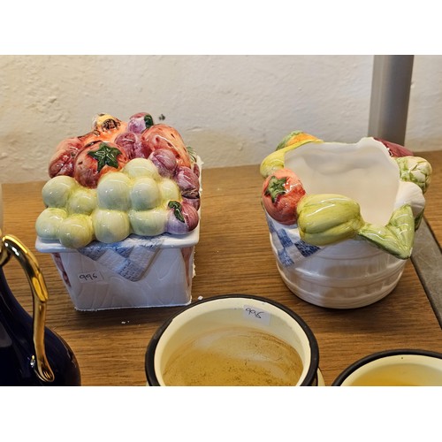 261 - A shelf full of collectable ceramics and earthenware to include 2 handmade salt sellers in the form ... 