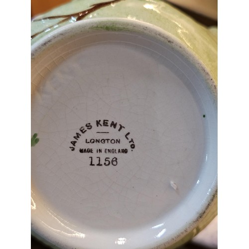 261 - A shelf full of collectable ceramics and earthenware to include 2 handmade salt sellers in the form ... 