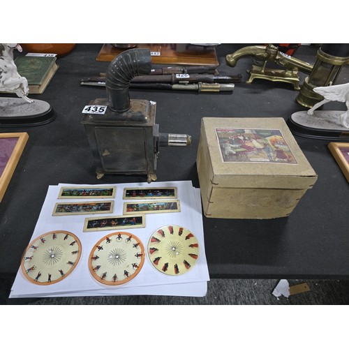 435 - A rare early 20th century German tin plate magic lantern bearing D.R.G.M registration mark, the lant... 