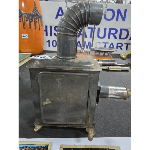 435 - A rare early 20th century German tin plate magic lantern bearing D.R.G.M registration mark, the lant... 