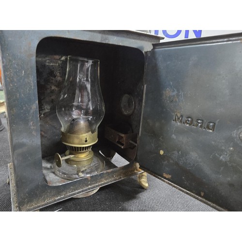 435 - A rare early 20th century German tin plate magic lantern bearing D.R.G.M registration mark, the lant... 