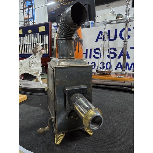 435 - A rare early 20th century German tin plate magic lantern bearing D.R.G.M registration mark, the lant... 