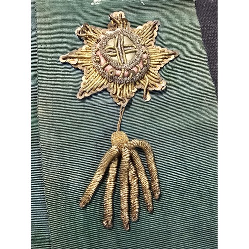 455 - A senior officers ceremonial sash of ribbed green moire silk prominently applied with genuine gold b... 