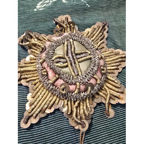 455 - A senior officers ceremonial sash of ribbed green moire silk prominently applied with genuine gold b... 
