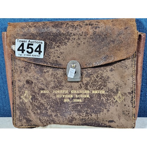 454 - A collection of good vintage Masonic related items to include a Masonic apron, 2x Masonic metal tass... 