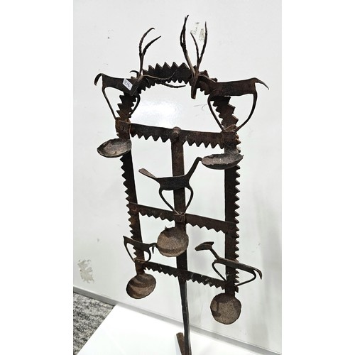 444 - An impressive antique large Indian tribal wrought iron oil lamp or diwali light stand, late 19th/ ea... 