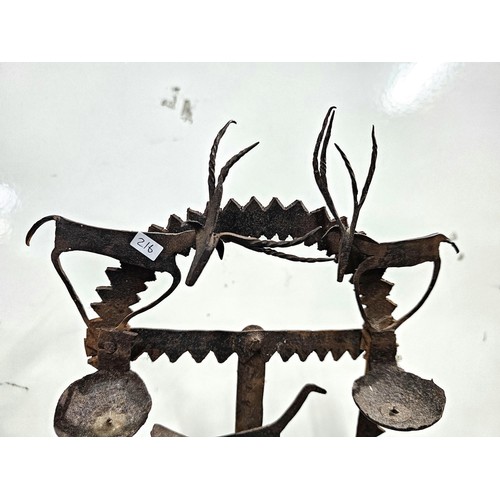 444 - An impressive antique large Indian tribal wrought iron oil lamp or diwali light stand, late 19th/ ea... 