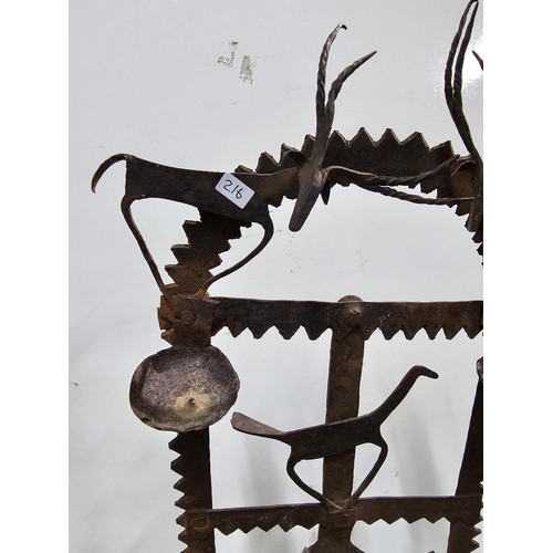 444 - An impressive antique large Indian tribal wrought iron oil lamp or diwali light stand, late 19th/ ea... 