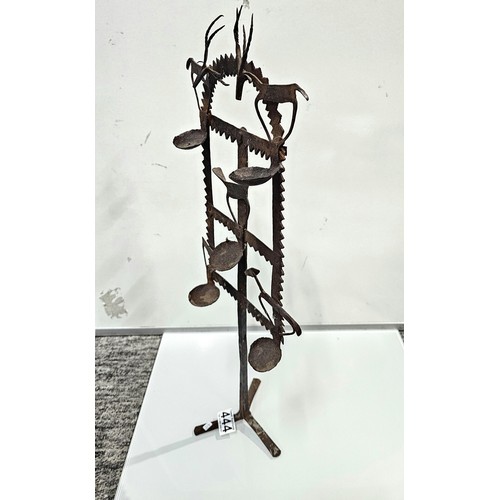 444 - An impressive antique large Indian tribal wrought iron oil lamp or diwali light stand, late 19th/ ea... 