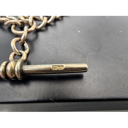 An attractive 9ct rose gold pocket watch Albert chain comprising 2 ...