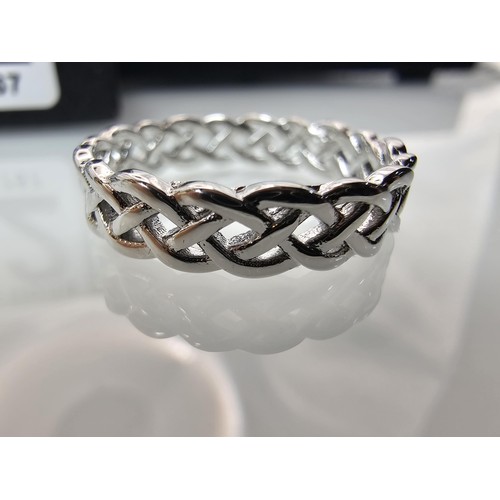352 - A brand new 925 Silver ring having a Celtic Knot pierced design all the way around. The ring is size... 