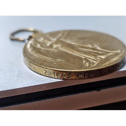 256 - A quantity of collectable badges to include 2x brass Institute Staff War Department identity tags da... 