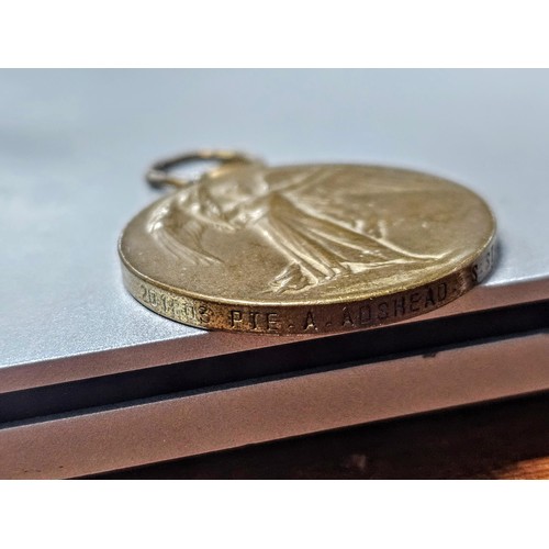 256 - A quantity of collectable badges to include 2x brass Institute Staff War Department identity tags da... 