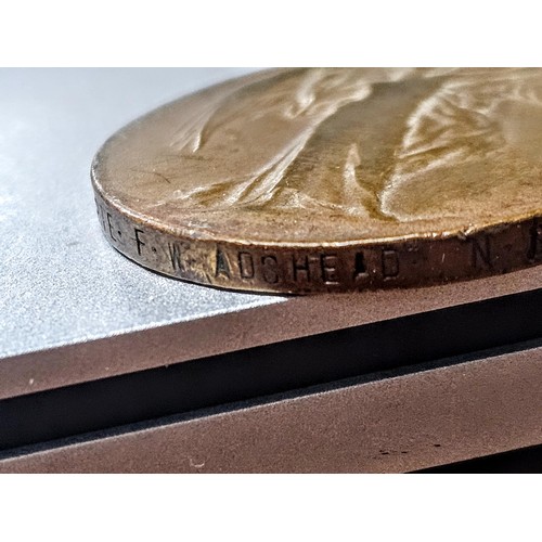 256 - A quantity of collectable badges to include 2x brass Institute Staff War Department identity tags da... 