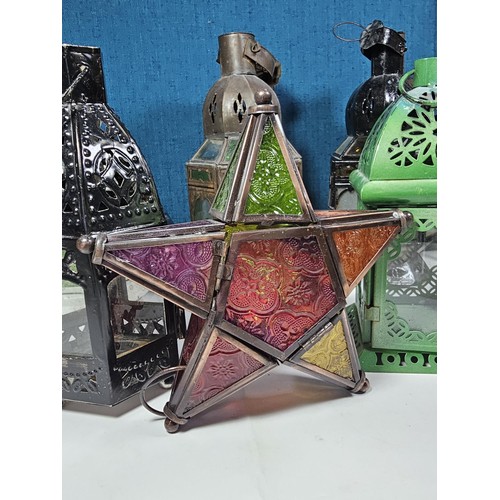 3 - A collection of nine tealight holders in the form of lamps. Most are in the Moroccan design. Largest... 