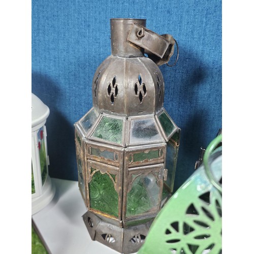 3 - A collection of nine tealight holders in the form of lamps. Most are in the Moroccan design. Largest... 