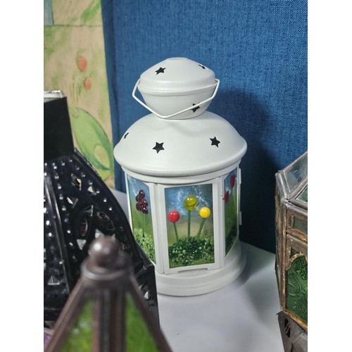 3 - A collection of nine tealight holders in the form of lamps. Most are in the Moroccan design. Largest... 