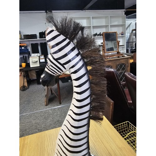 8 - A collection of three graduated wooden zebra's figures in a comical design. One of the zebra's has a... 