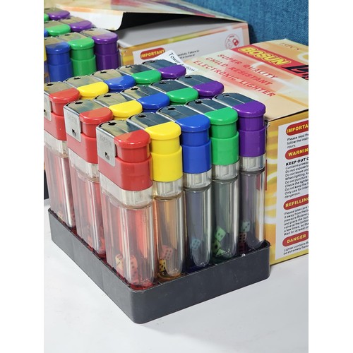 11 - Two boxed as new Bosum lighters, 15 in each packet. All lighters are oversized with diced decoration... 