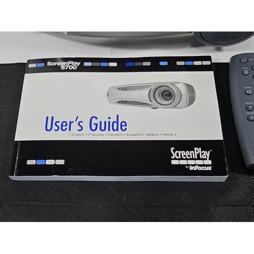 25 - A Infocus Screenplay 5700 good quality Projector with a HDMI Converter cable, power cable and instru... 