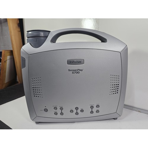 25 - A Infocus Screenplay 5700 good quality Projector with a HDMI Converter cable, power cable and instru... 