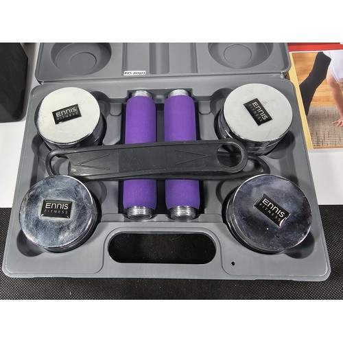 30 - A cased set of Ennis Fitness weights, a pair of foam blocks and a manual for Yoga for over 50's.