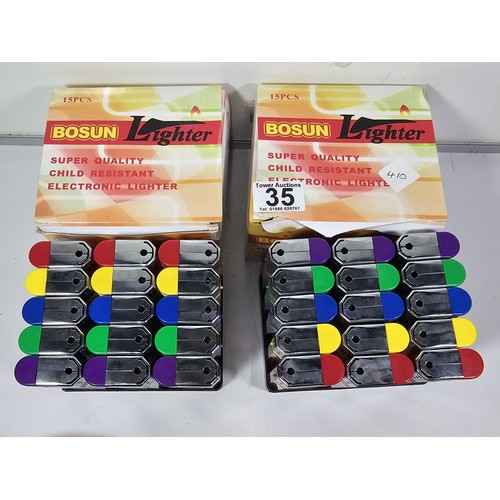 35 - 2x as new boxes of Bosun lighters both contain 15 lighters all are oversized with dice decorations