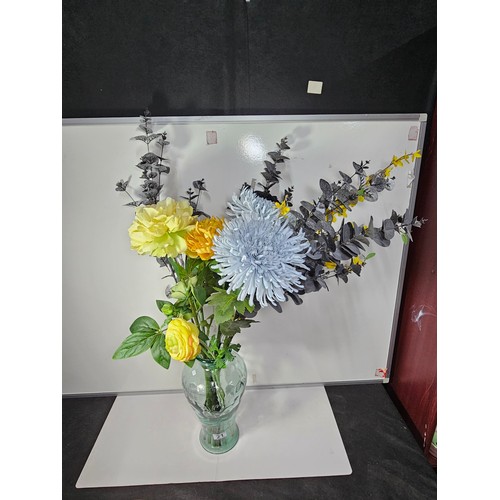 21 - A good quality glass vase with firing imperfections containing a quantity of artificial flowers. alo... 
