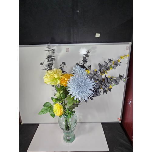21 - A good quality glass vase with firing imperfections containing a quantity of artificial flowers. alo... 