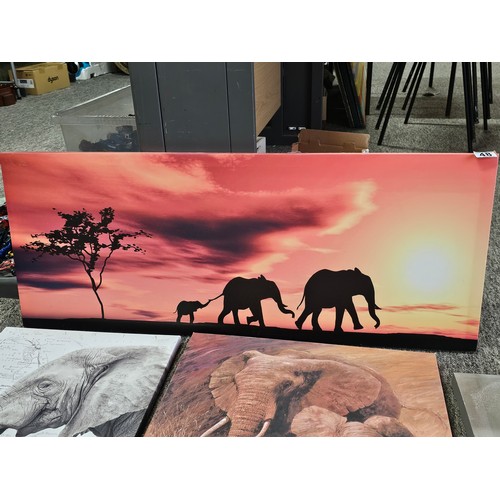 48 - A collection of 5x stretch canvas prints of elephants to include 2 matching pictures of mother and c... 
