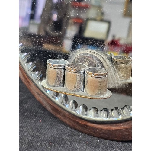 59 - A good quality antique oval shaped bevel shaped mirror with fluting to the edge of the mirror, the m... 