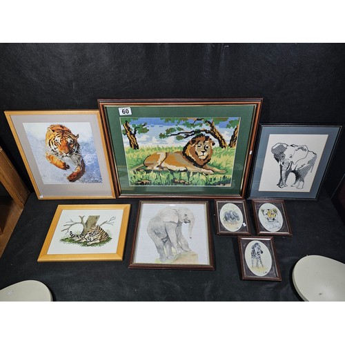 60 - A collection of 8x framed and glazed pictures to include 3x needlepoint pictures of a Lion, Tiger an... 