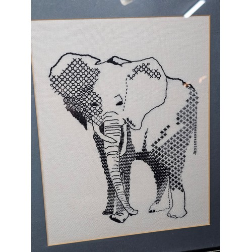 60 - A collection of 8x framed and glazed pictures to include 3x needlepoint pictures of a Lion, Tiger an... 
