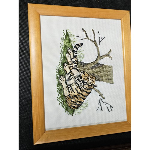 60 - A collection of 8x framed and glazed pictures to include 3x needlepoint pictures of a Lion, Tiger an... 