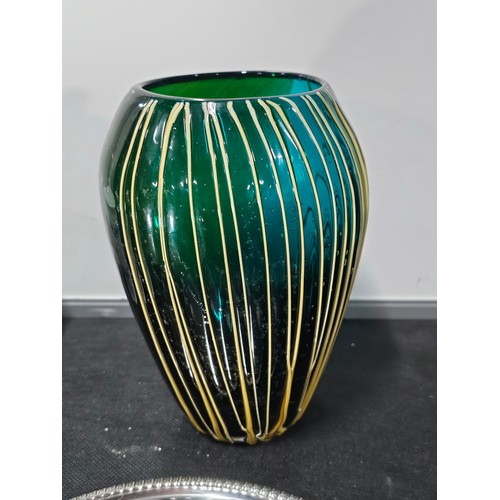 62 - Shelf full of collectables to include a very large trumpet vase in deep red along with 3x matching b... 