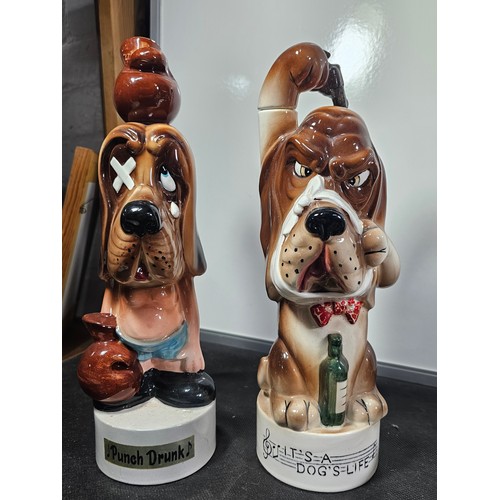 64 - Collection of 9x vintage character decanters with musical bases to include a Scotsman on a lamp post... 