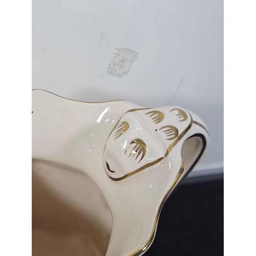 67 - A shelf of collectable to include a good quality liberty art deco style jug, a pair of hand painted ... 