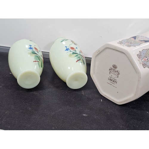 67 - A shelf of collectable to include a good quality liberty art deco style jug, a pair of hand painted ... 