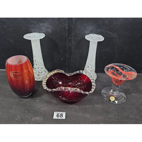 68 - A small quantity of collectable glassware to include two white and black spotted candle holders with... 