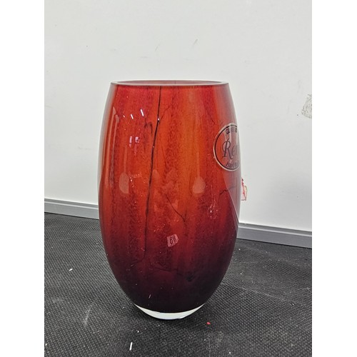 68 - A small quantity of collectable glassware to include two white and black spotted candle holders with... 