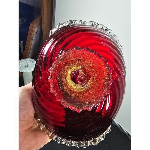 68 - A small quantity of collectable glassware to include two white and black spotted candle holders with... 