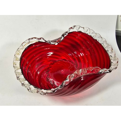 68 - A small quantity of collectable glassware to include two white and black spotted candle holders with... 