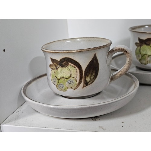 72 - A large partial tea dinner set by Denby consisting of 28 pieces to include 6 cups and saucers, 6 egg... 