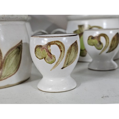 72 - A large partial tea dinner set by Denby consisting of 28 pieces to include 6 cups and saucers, 6 egg... 