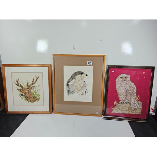 80 - A collection of 3 pictures to include a hand painted water colour of a Kestrel, a needlepoint pictur... 